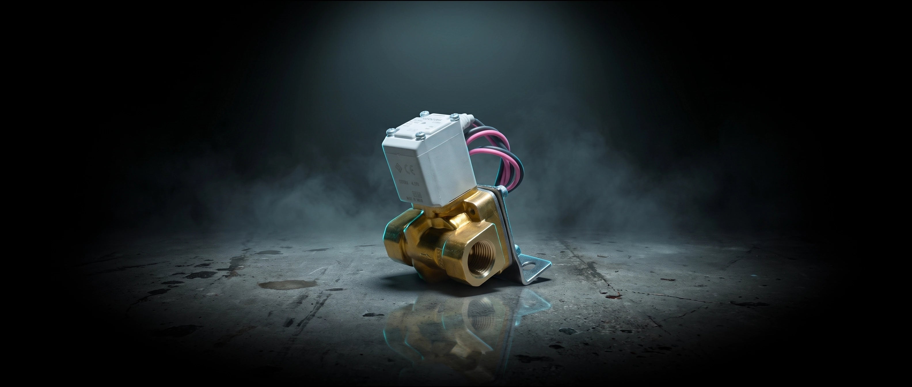 SMC Brass 1/2" 24-Volt Electric Air Valve in dramatic cinematic light